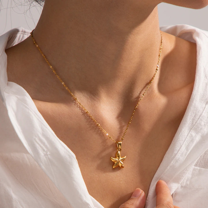 Moira gullbelagt halskjede med sjøstjerne